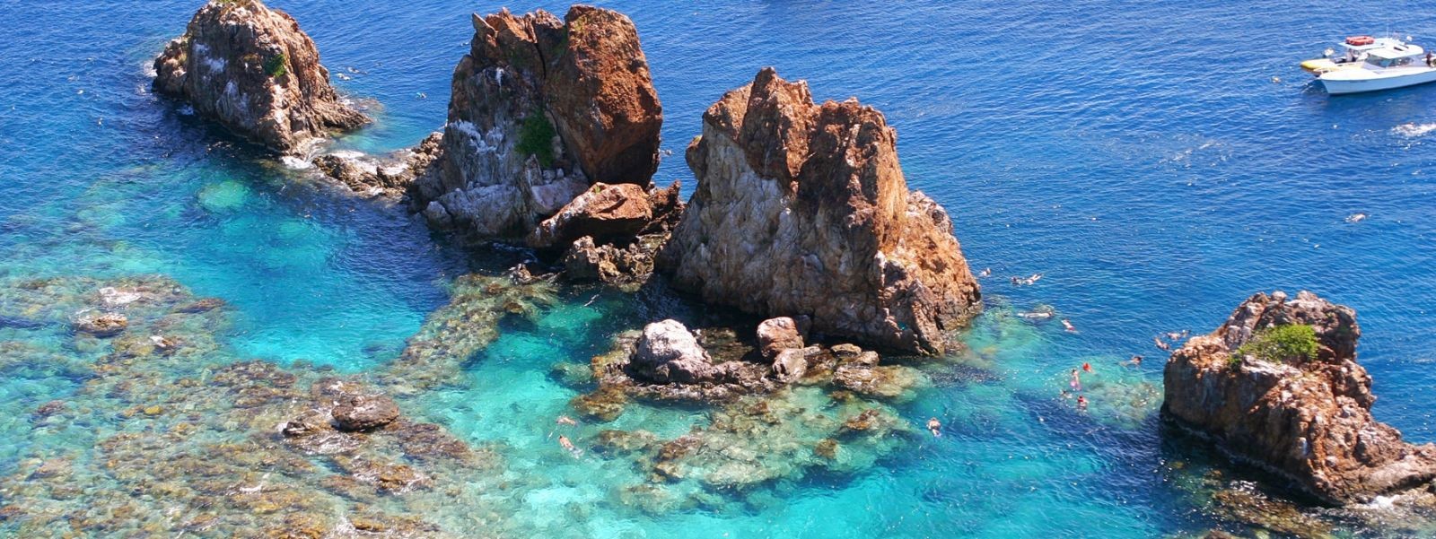 Impressive rock formations and coral reefs
